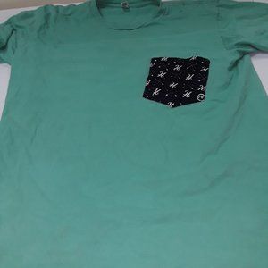 Green T-shirt with navy and white pocket